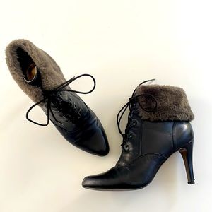 High heeled sexy lace up boots by Ellen Tracy. Lightly worn with original box.